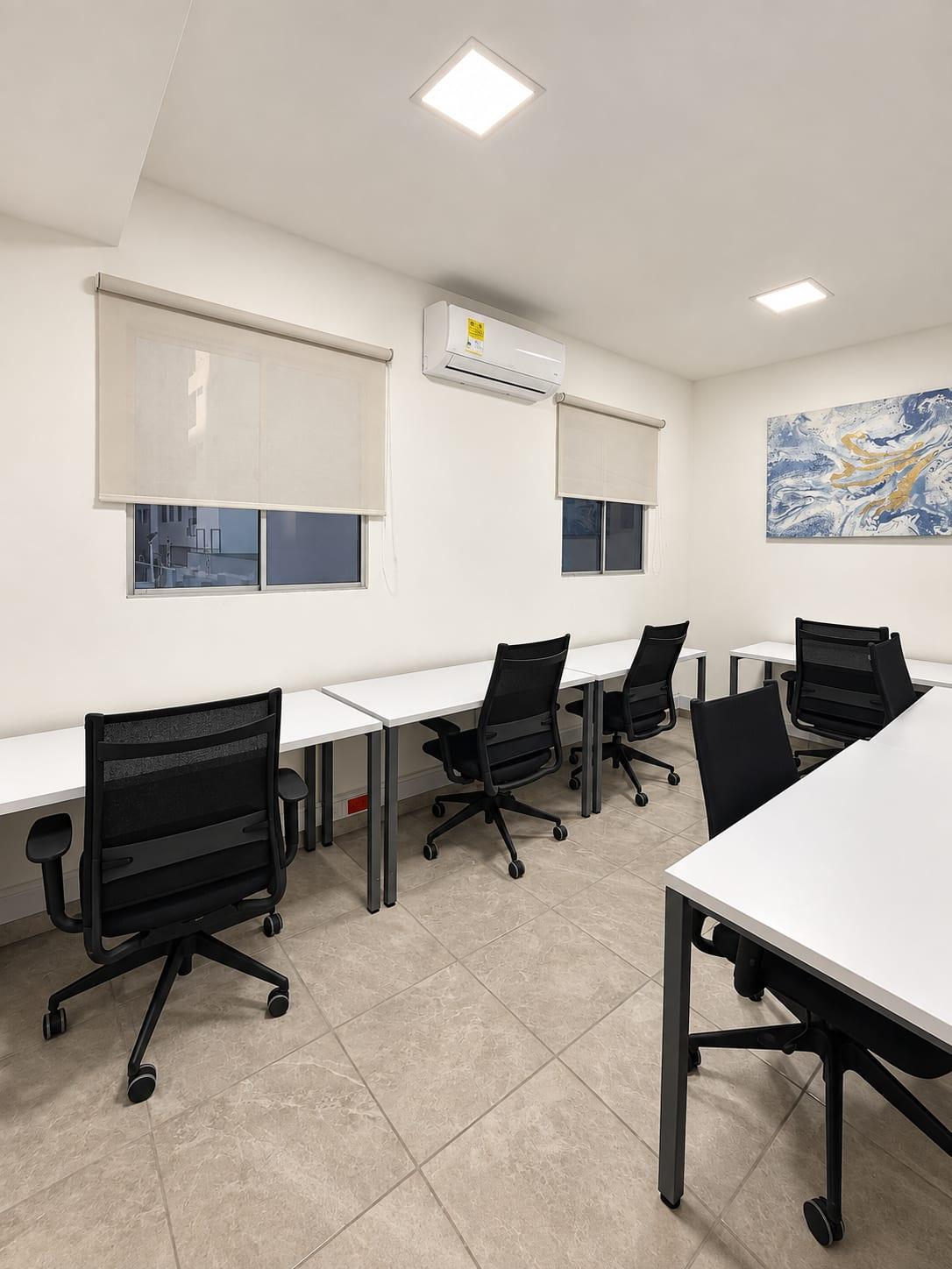 Desk room with windows and natural light